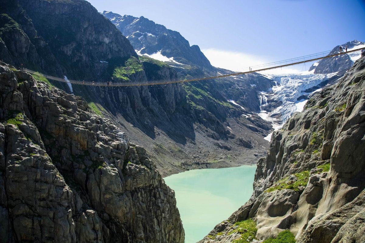 The Trift Bridge offers fantastic mountain walks and stunning views of the Trift Glacier Lake and the glacier tongue, Switzerland - © Foto Zihlmann / Fotolia